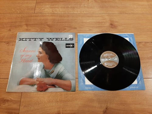 Kitty wells seasons - -, of