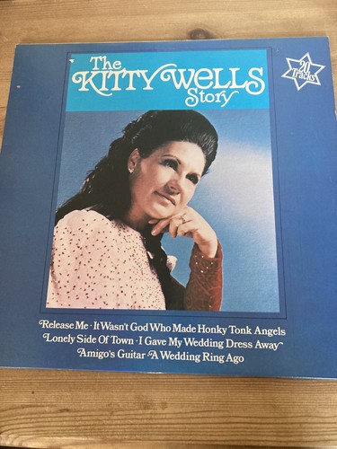 Kitty wells the - -,