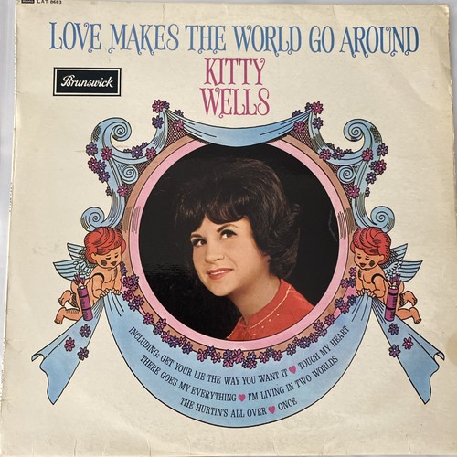 Kitty wells love makes the - kitty,